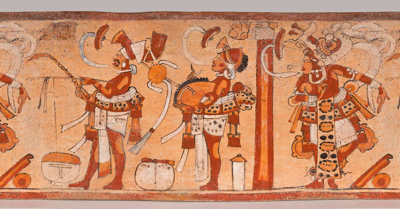 تصویری مربوط به نگاره ای از تمدن مایا. نوازندگان (وسط و راست) در حال نواختن یک طبل گوش‌خراش (وسط) و یک خراشنده بزرگ به شکل جگوار (راست) هستند.